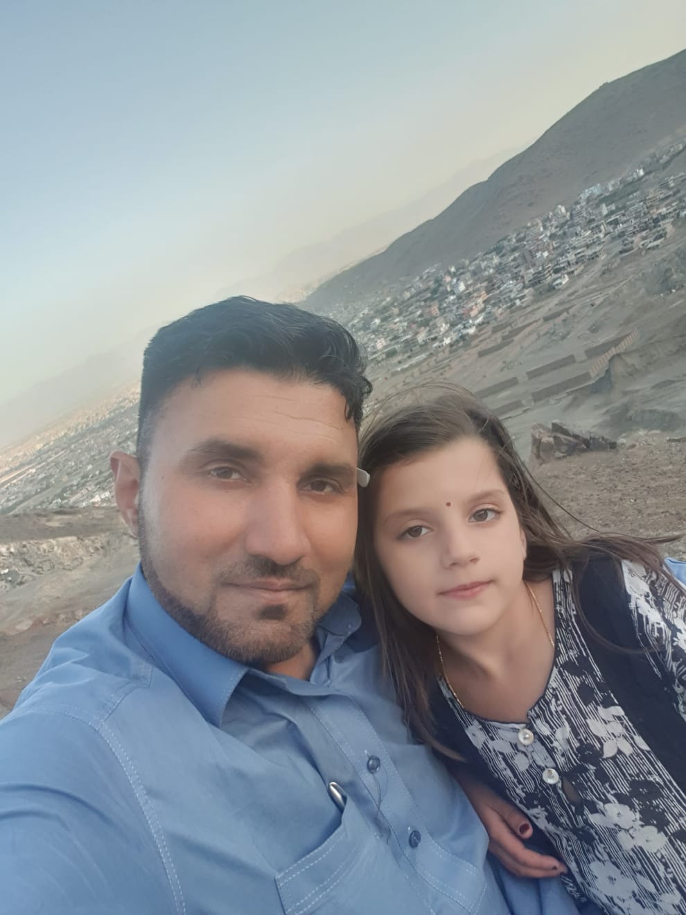 Jan Mohammad Ahmadzai and his daughter.