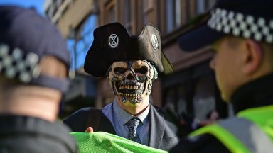 In pictures: Protests and politics as COP26 comes to Glasgow