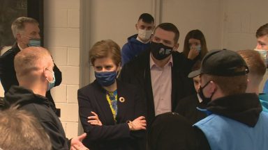 First Minister Nicola Sturgeon and Scottish Conservatives leader Douglas Ross visited Bluevale Community Club in Glasgow.