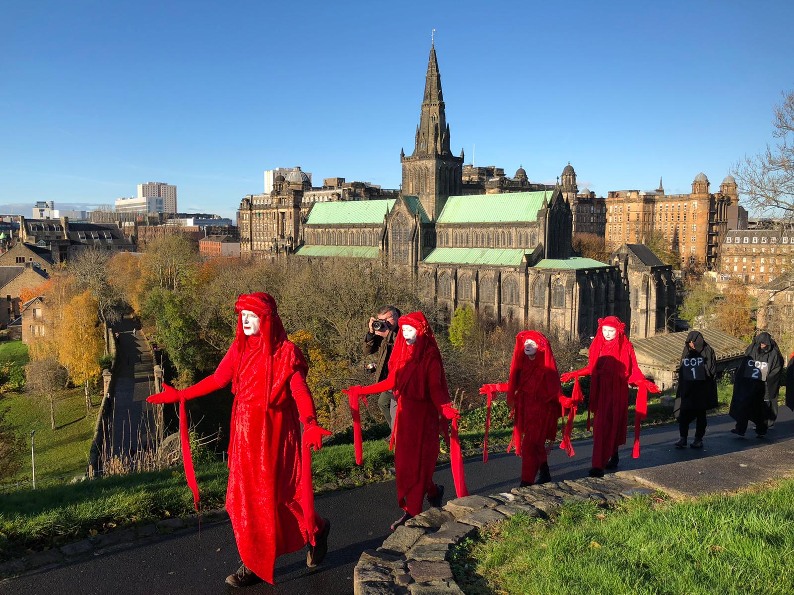  The protesters led a procession through the grounds.