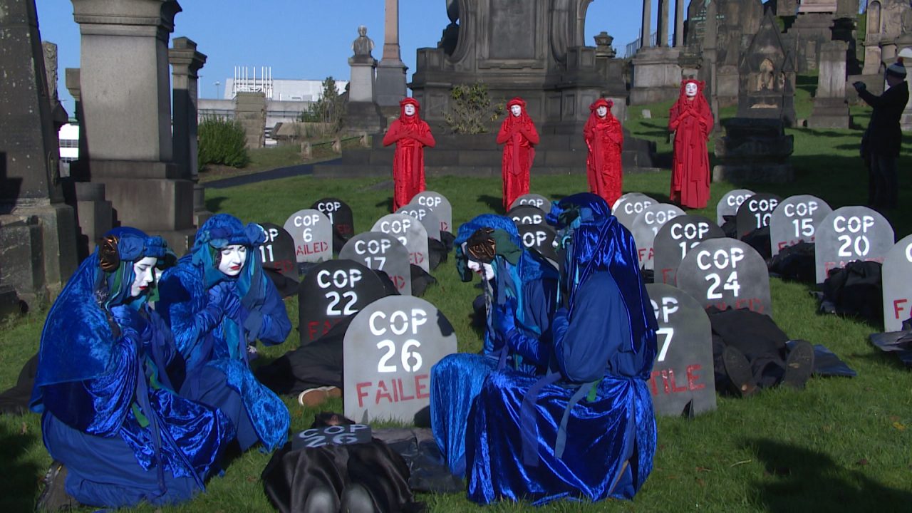 Extinction Rebellion activists held a protest at Glasgow's Necropolis.