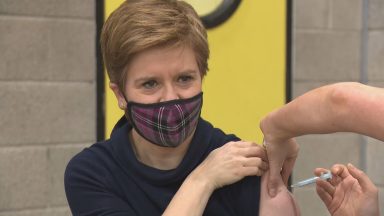 Sturgeon urges people to get Covid vaccine as she receives booster