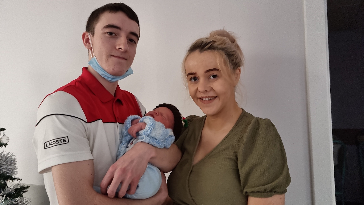 Mum Emma Geary and dad Ben Fox, from Alexandria, with Oliver.