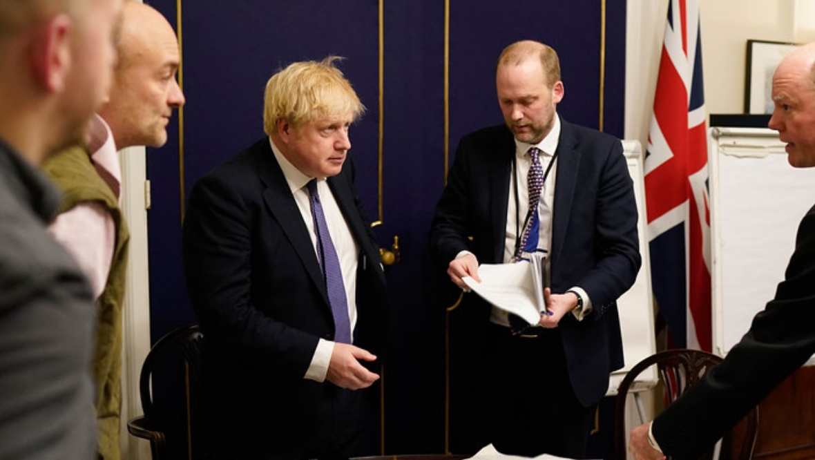 Prime Minister Boris Johnson and Jack Doyle in his office of No 10 Downing Street.
