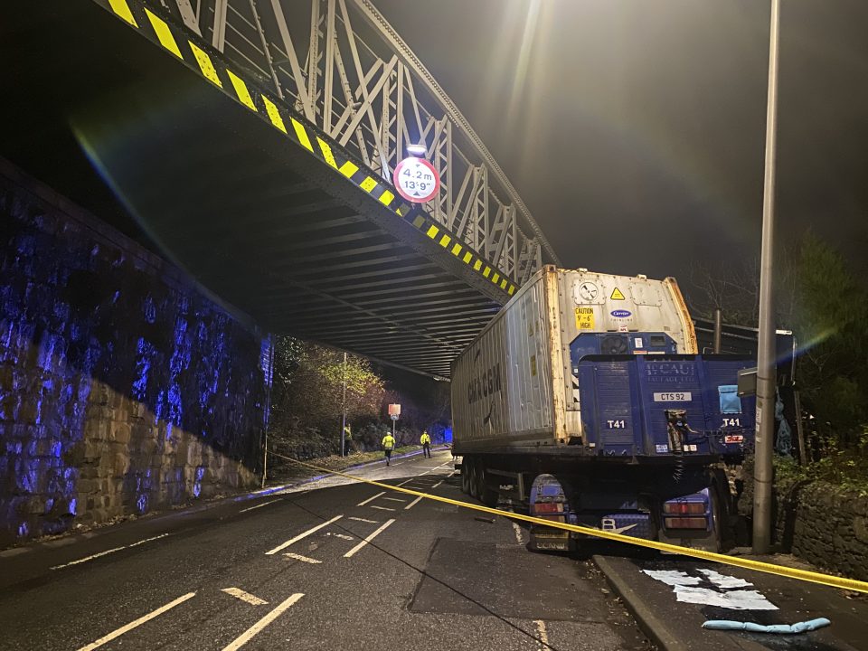 Heavy goods vehicle full of potatoes crashes into railway bridge