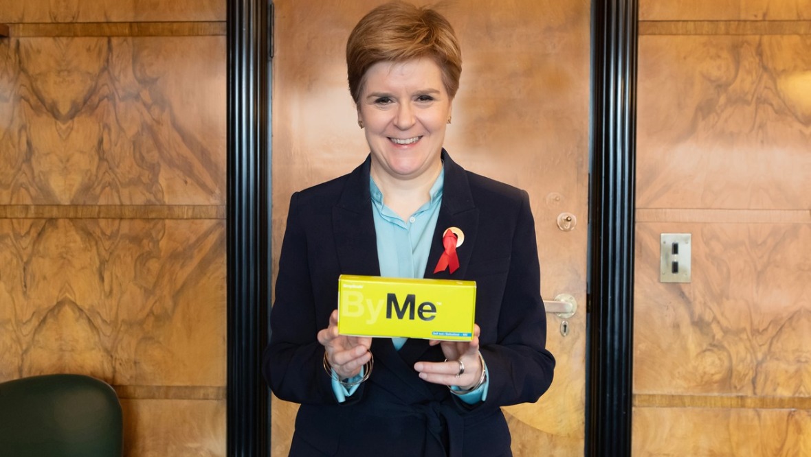 First Minister Nicola Sturgeon with one of the home-testing kits.