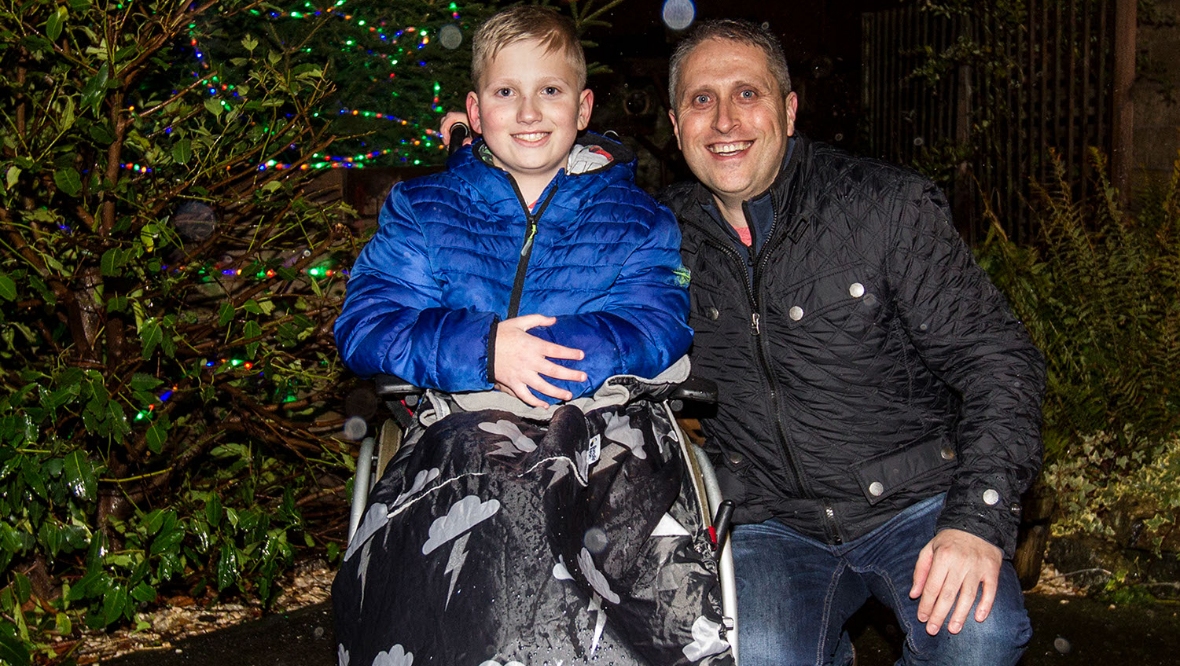 Schoolboy switches on village Christmas lights after suffering stroke