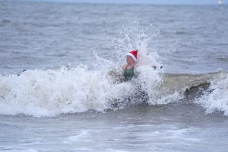 Swimmers brave the cold sea for Christmas Day dip