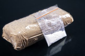 Woman arrested after cocaine and heroin worth £200,000 seized in Clydebank raid