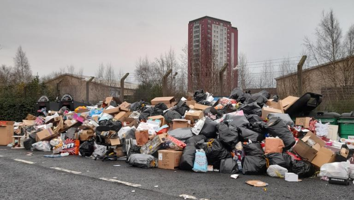 Which Scottish local councils are facing school closures and bin strikes after workers vote against pay deal?