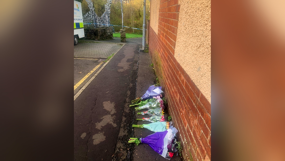 Hamilton: Flowers left in tribute to the murdered teen.