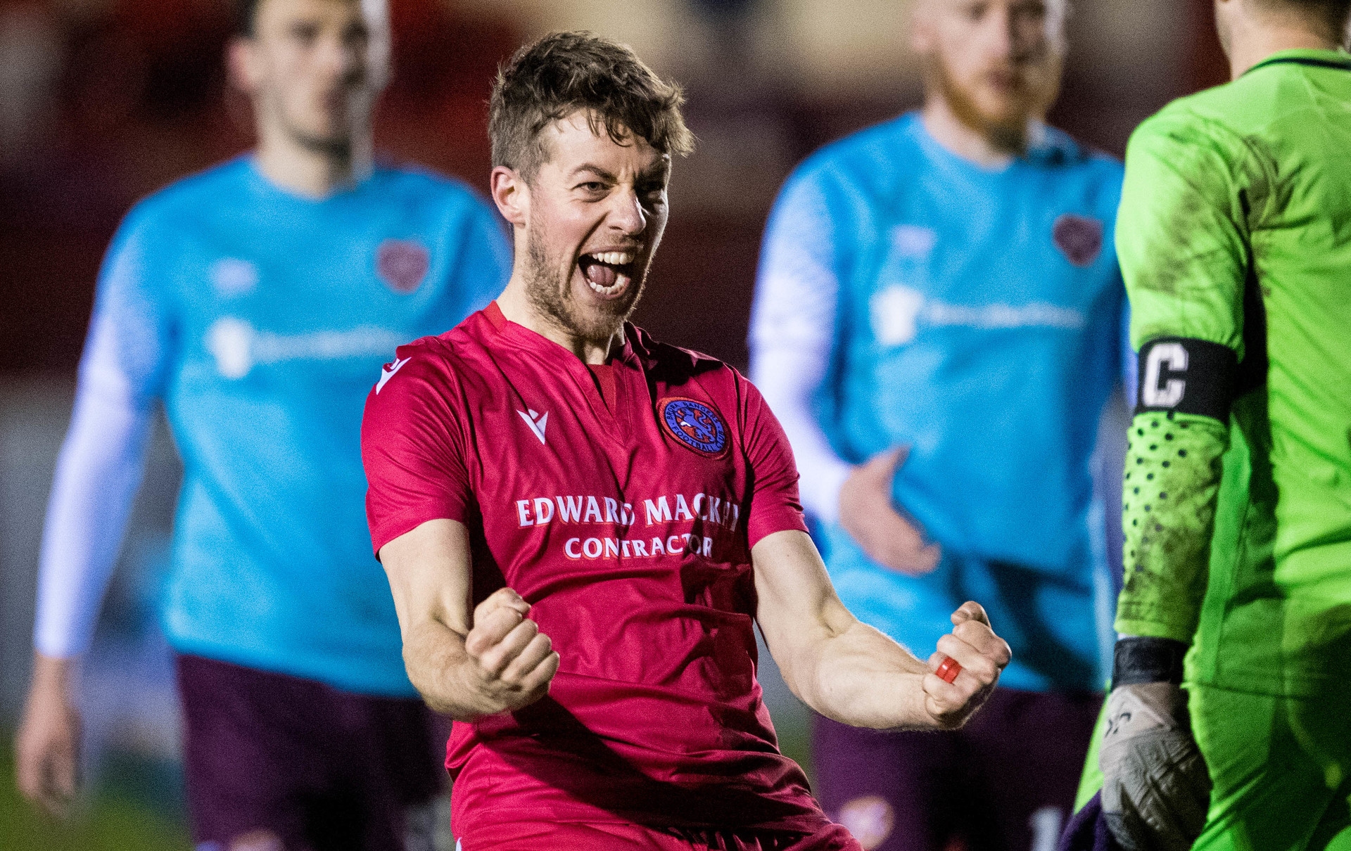 Martin MacLean celebrates the Highland League side's shock win.