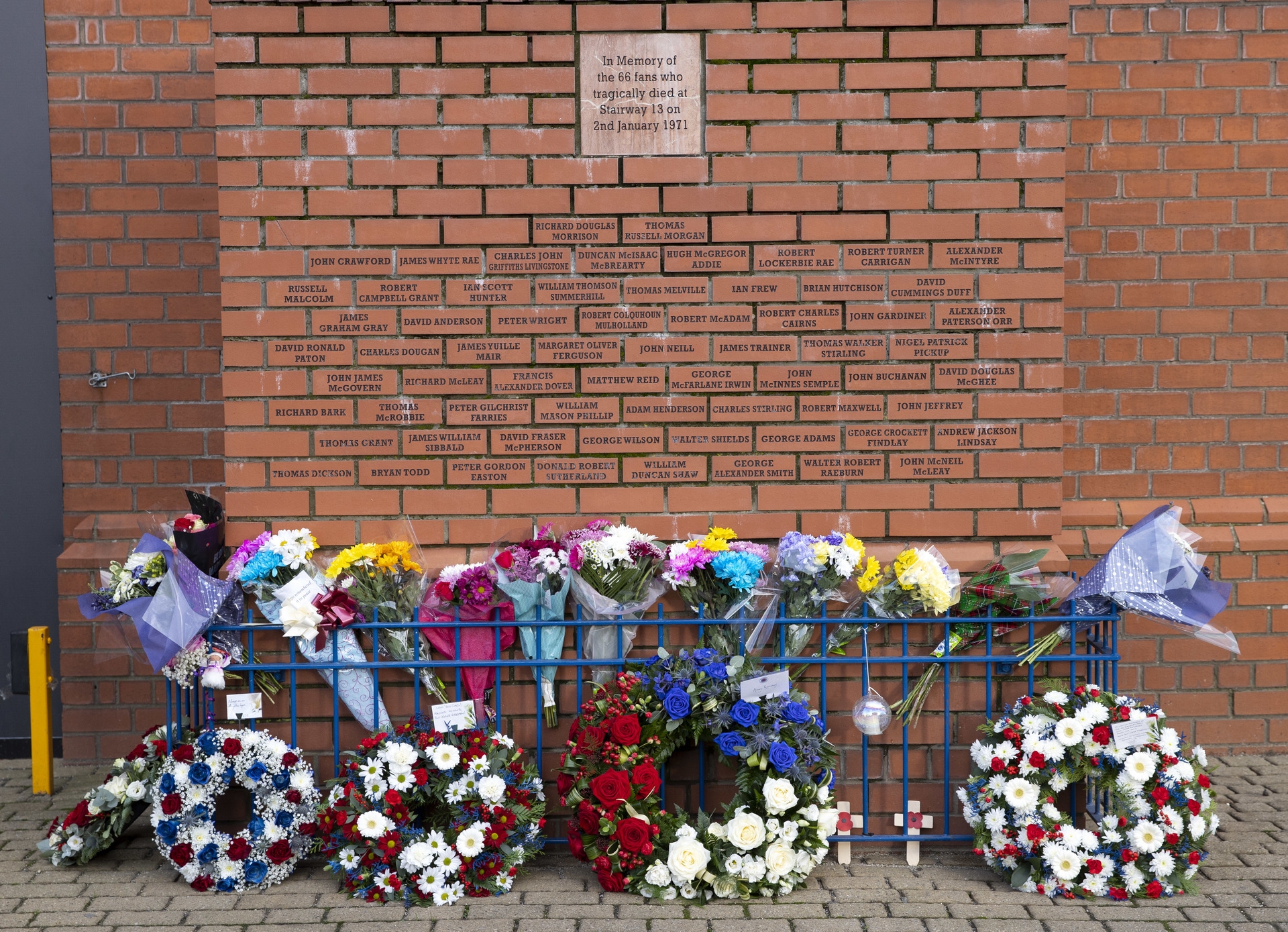 Flowers were laid at the stadium in memory of those who died.  (Photo by Alan Harvey / SNS Group)
