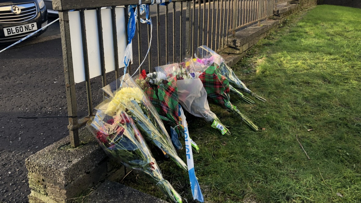 Greenock: Flowers have been left in tribute.