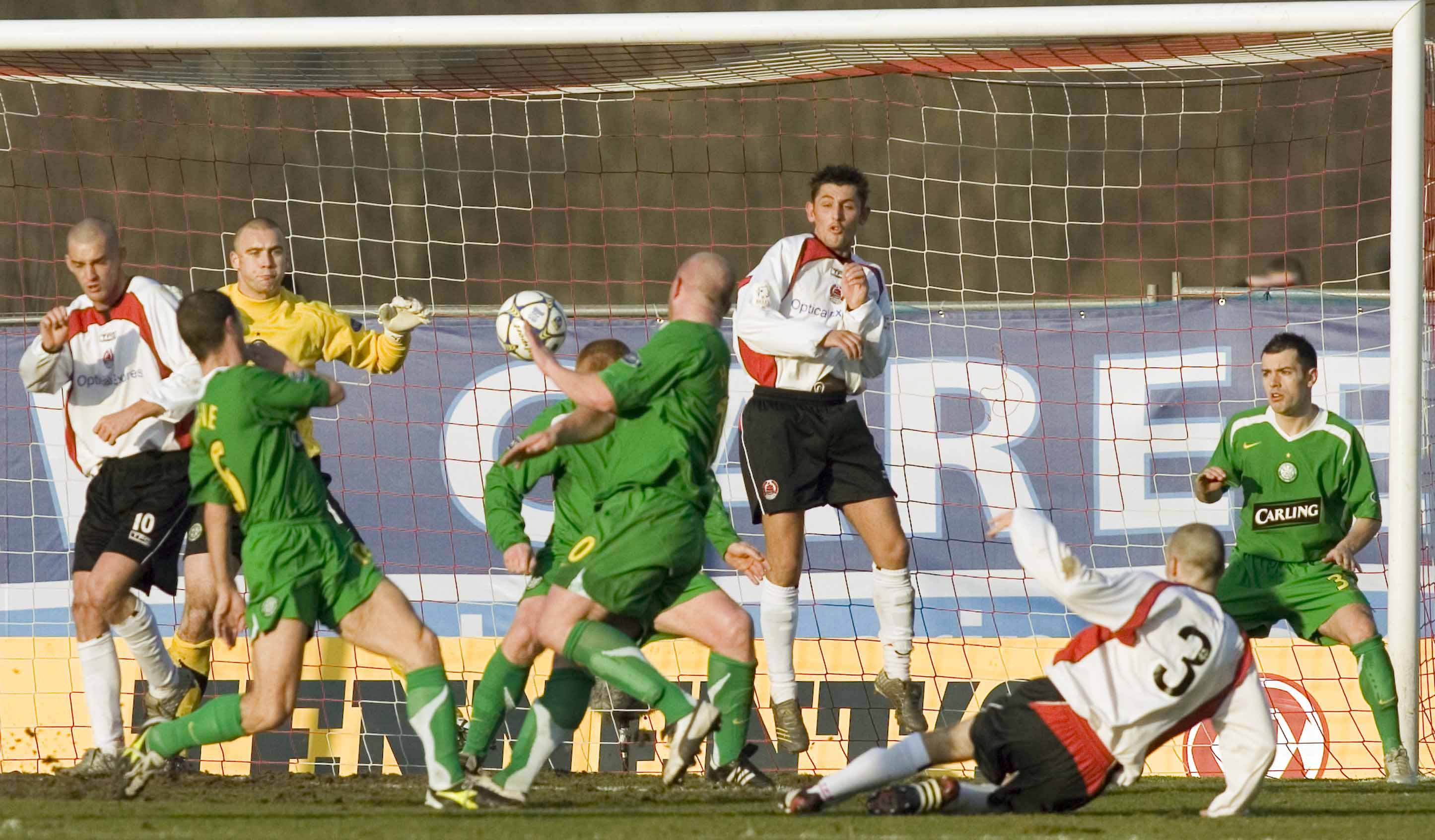 Eddie Malone (No 3) stretches to get on the end of a corner and smash a volley home for Clyde.