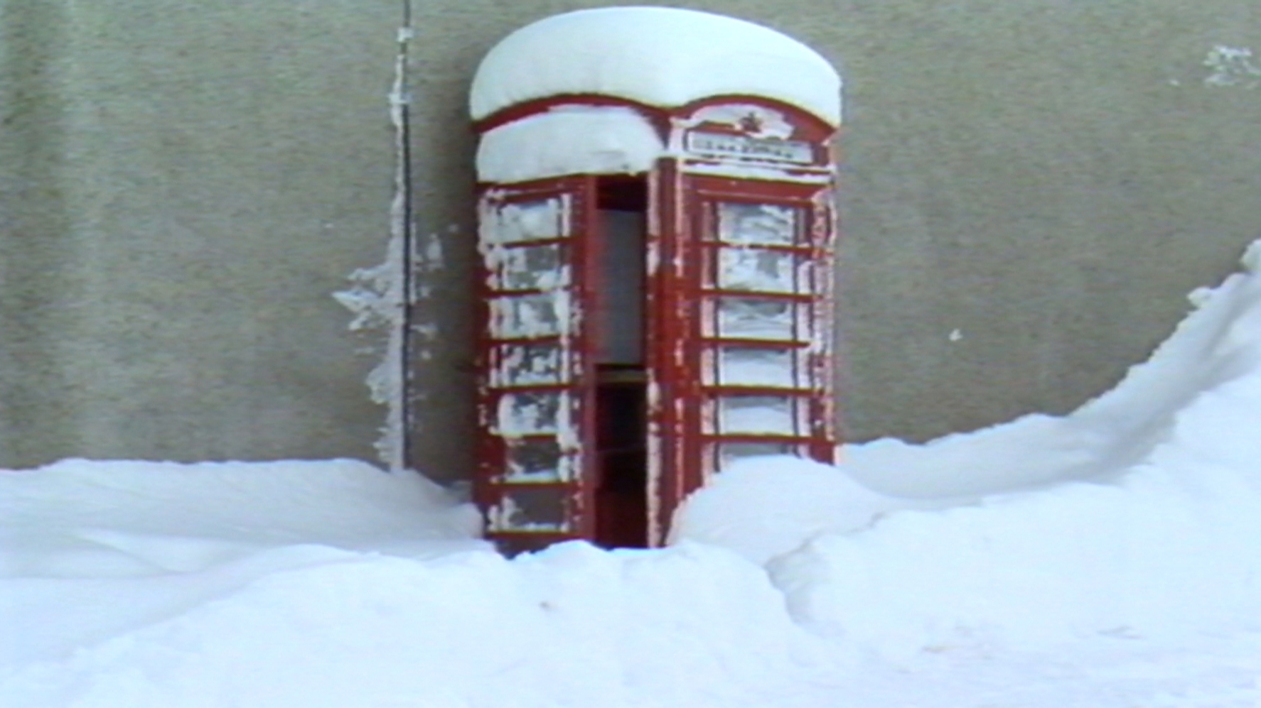 A phone box covered in snow in Braemar in January 1982.