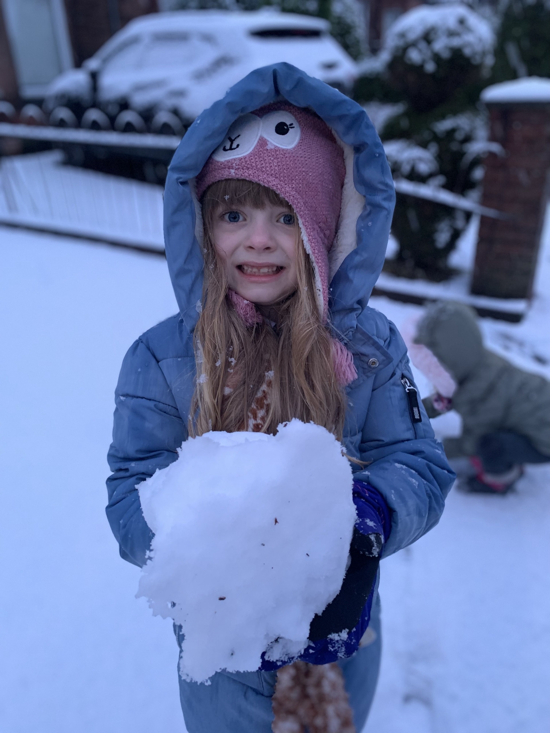 Fun in the sun: Children playing as schools and nurseries announce closures or delayed start times.