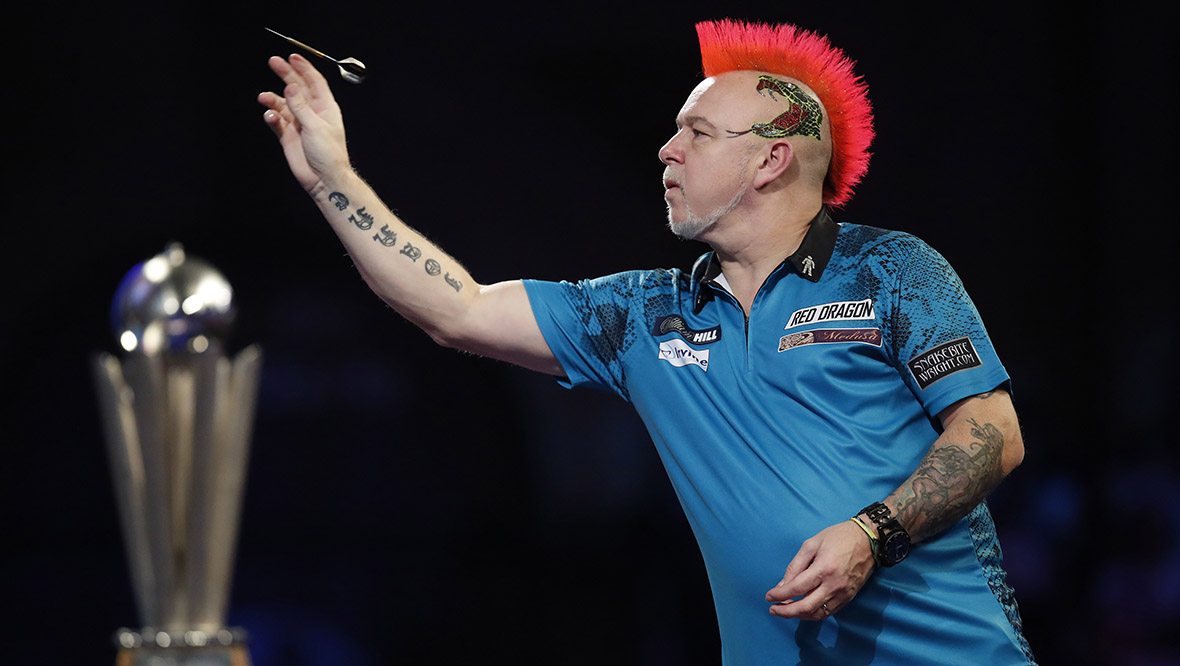 Peter Wright triumphs on opening night of revamped Premier League