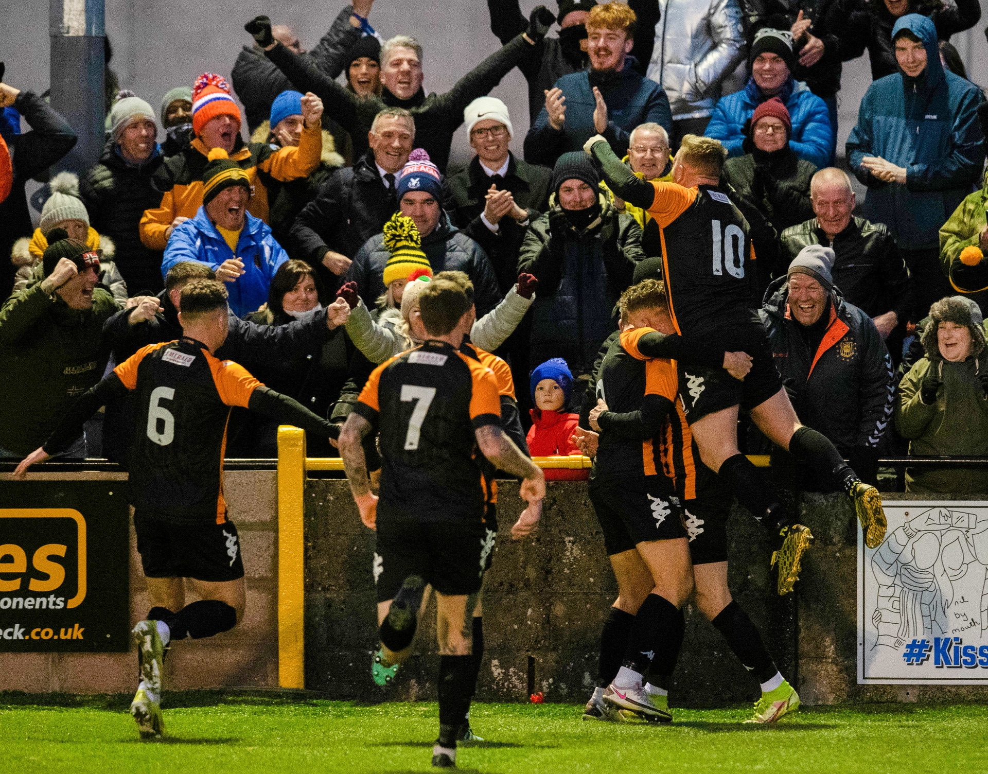 Wild celebrations as Graham Wilson scores the only goal of the match for the junior outfit.