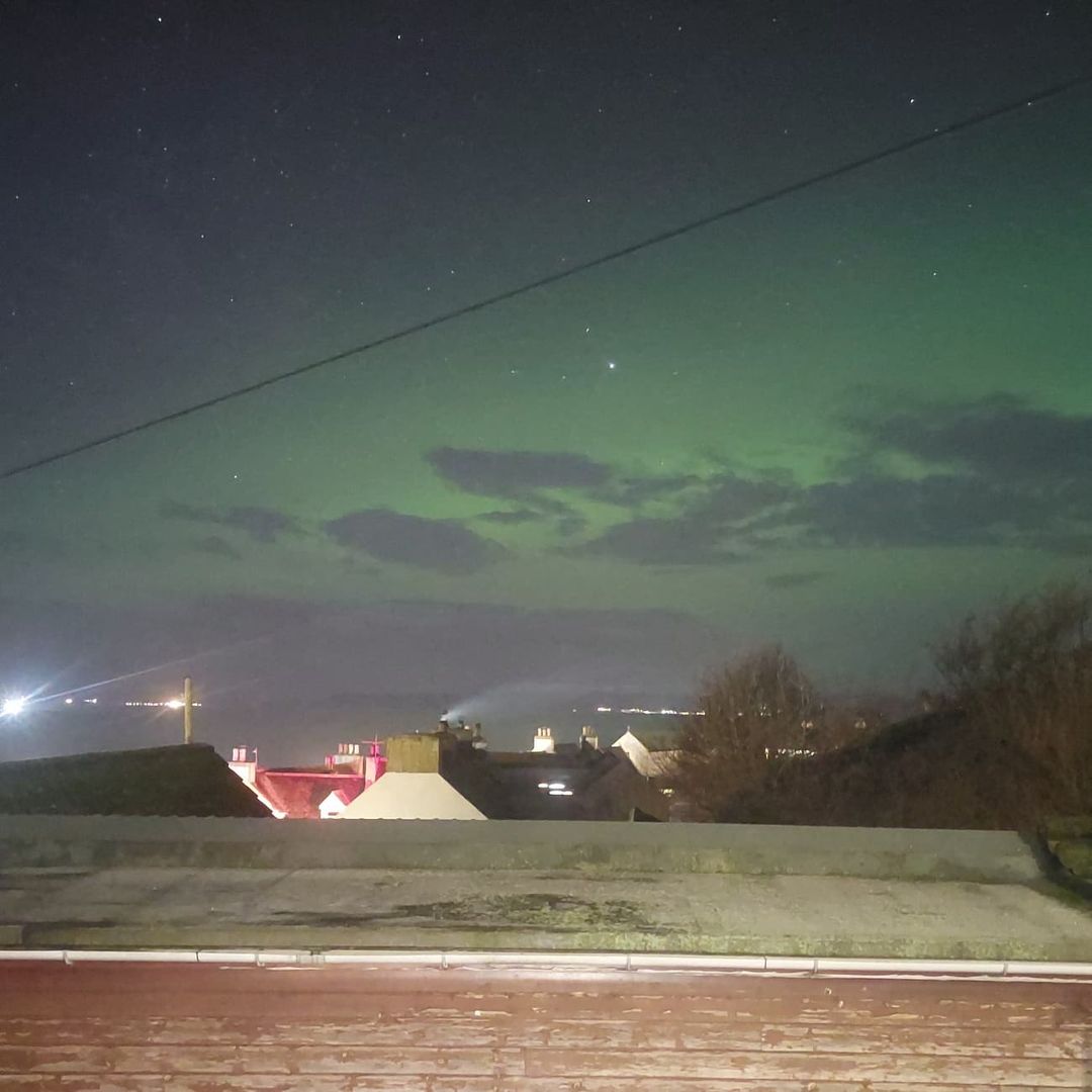 The Northern Lights could be seen over the houses. (STV News)