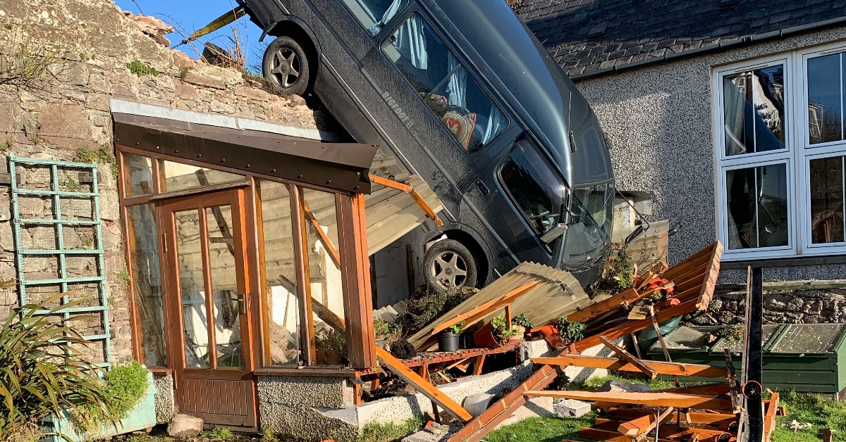 Gardener and driver in lucky escape after van crushes greenhouse