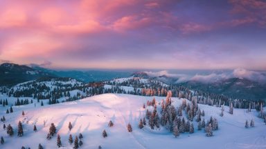 Stock image of a sunset snow scene.