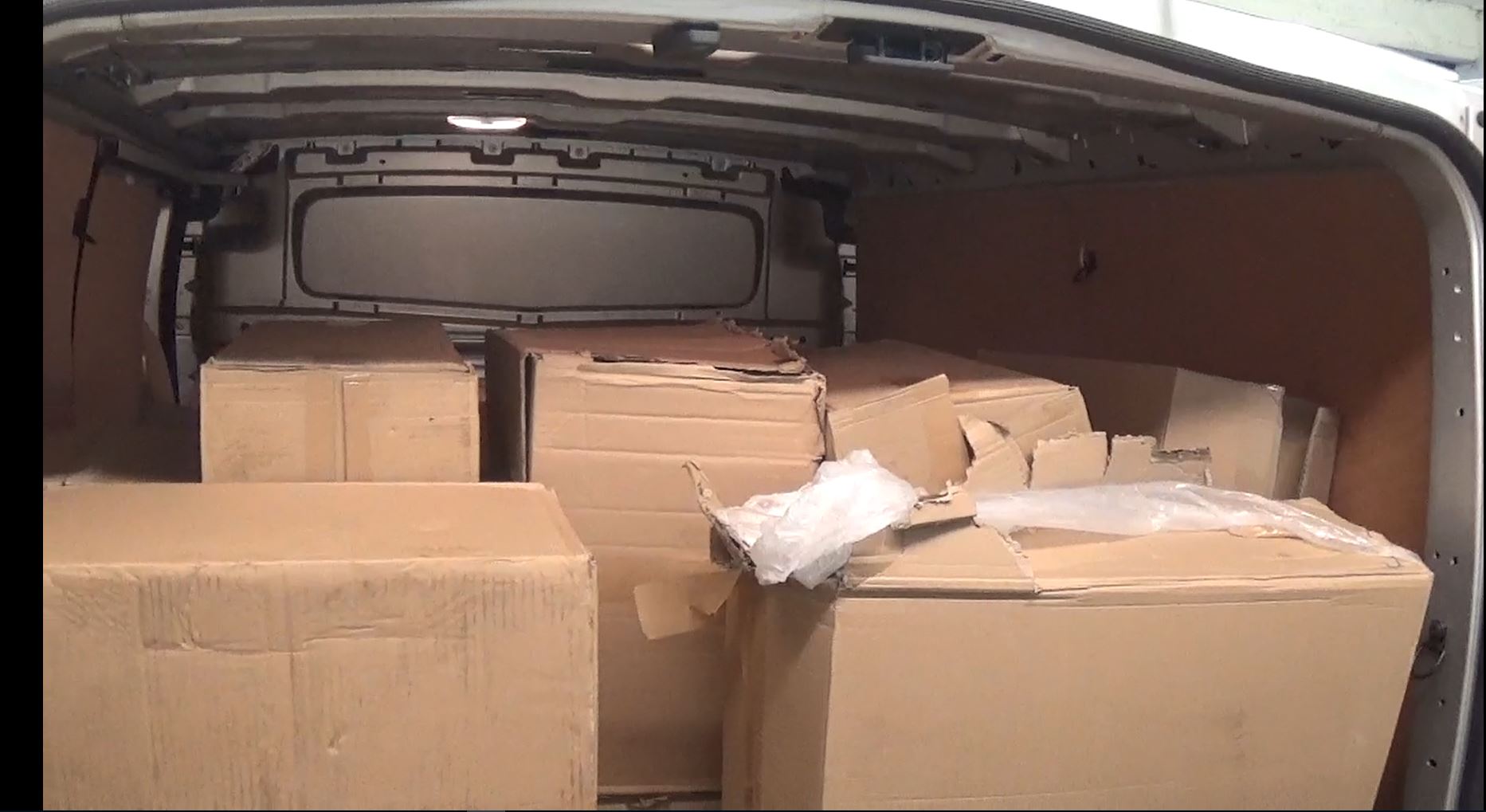 Police found several boxes containing thousands of cigarettes.