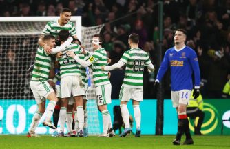 Celtic beat Rangers 3-0 to claim top spot in Premiership
