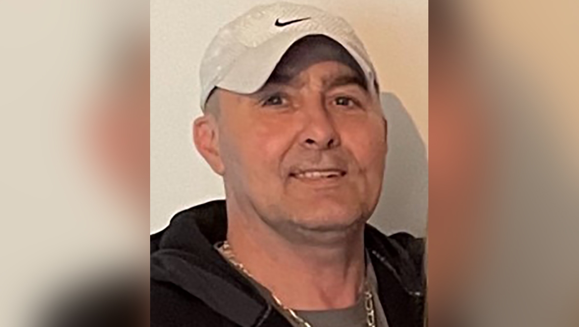 Two people arrested after body of Brian Maley discovered at flat in Springburn area of Glasgow