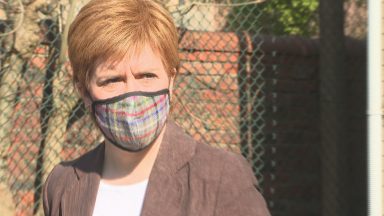 First Minister Nicola Sturgeon apologises for not wearing face mask after police remind her to follow the law