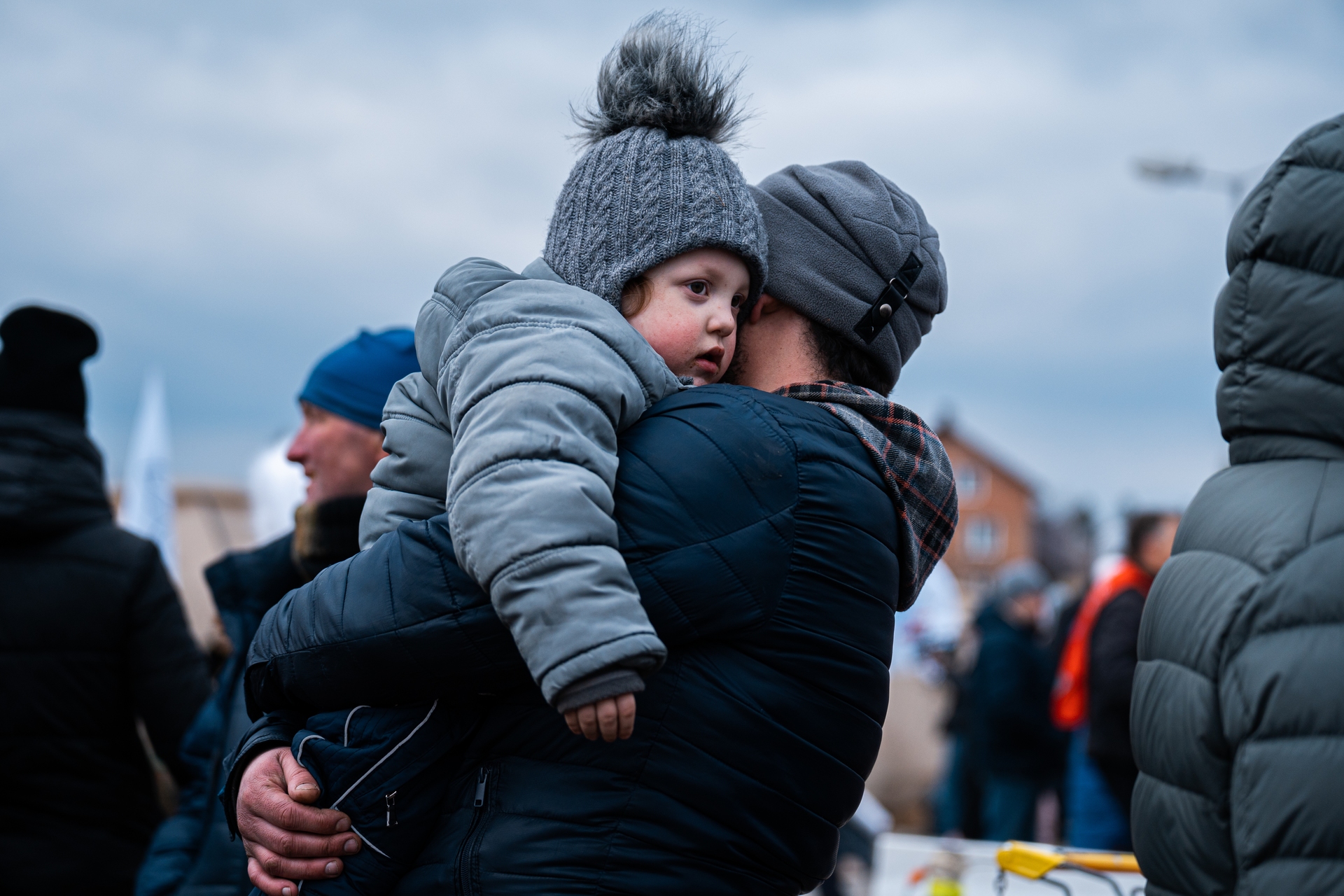 Children were carried into Poland in search of safety.