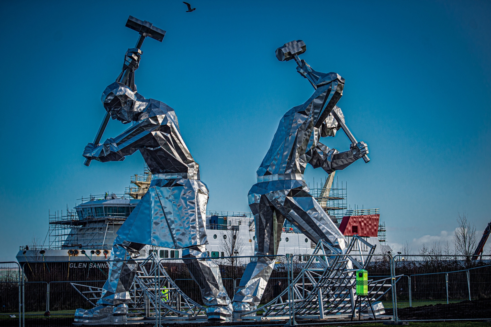 The 'Shipbuilder of Port Glasgow’ stainless steel figures in Port Glasgow's Coronation Park.