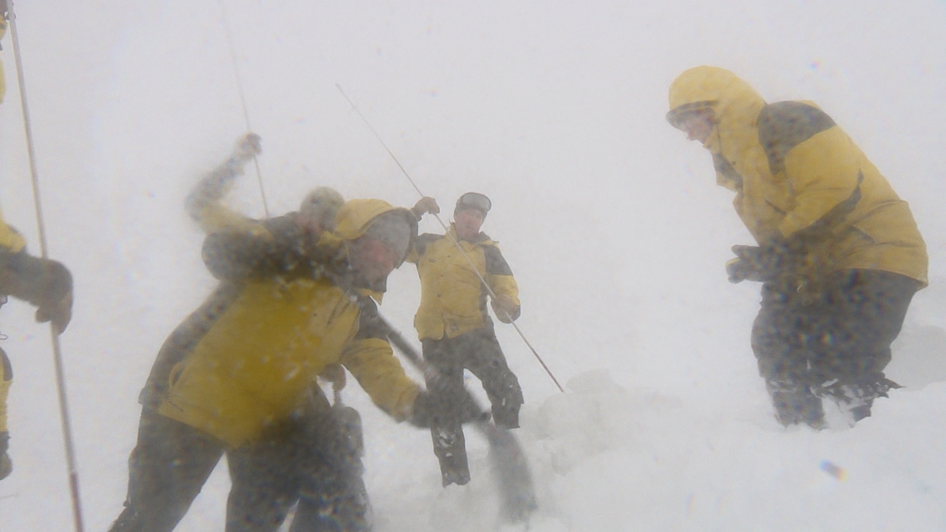 Volunteers dig Kaye out from deep snow.