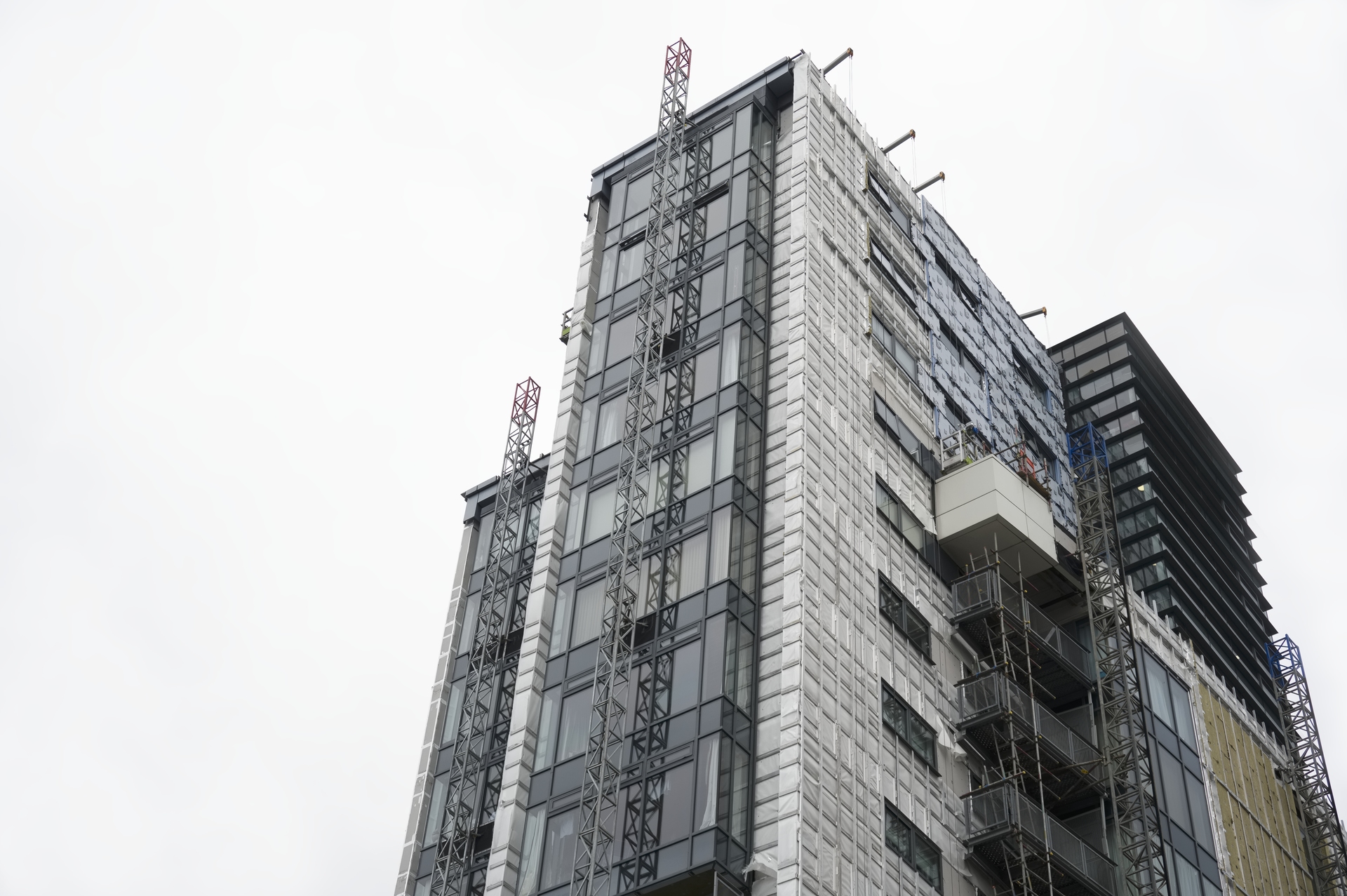 High rise residential building of flats with cladding being replaced with fire resistant materials.