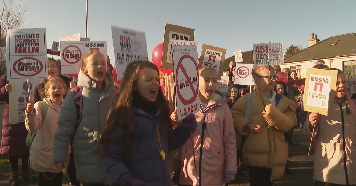 Parents and their children assembled for a protest against the changes on Thursday.