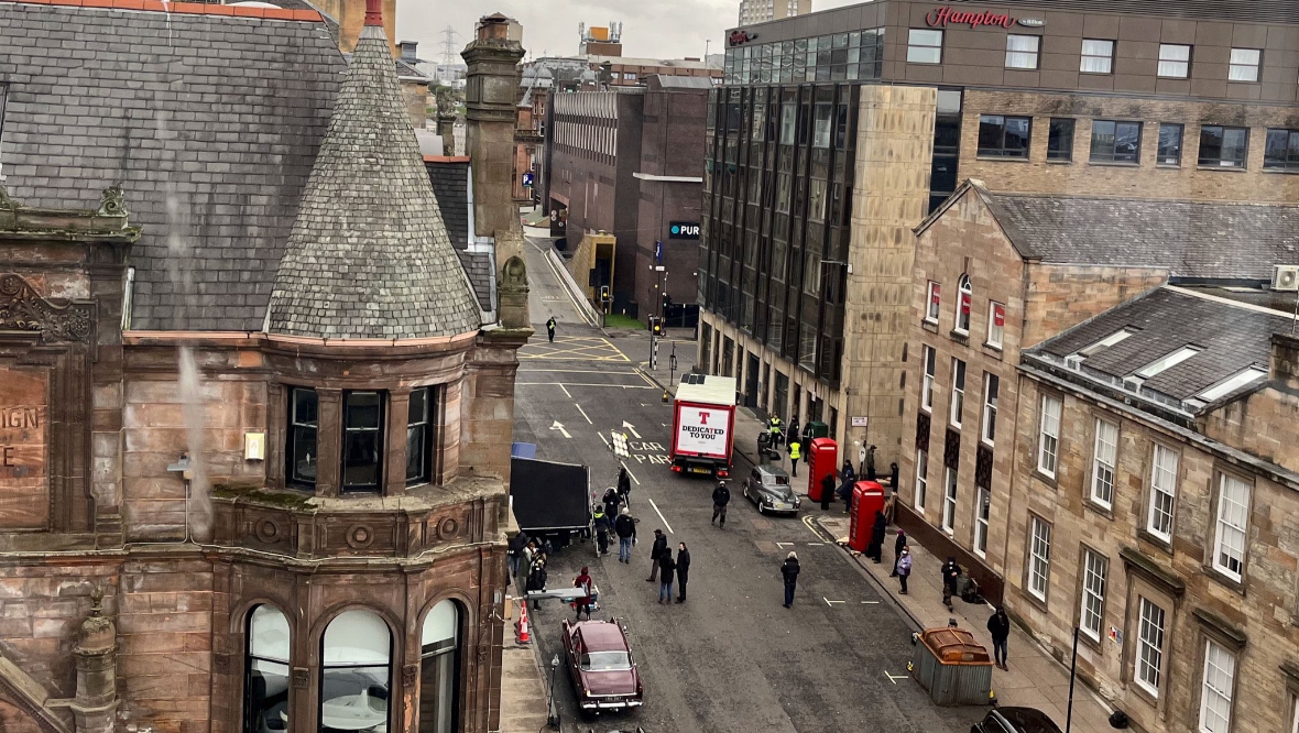 Tennent’s Lager truck disrupts filming of blockbuster movie ‘Borderland’ on West Campbell Street, Glasgow
