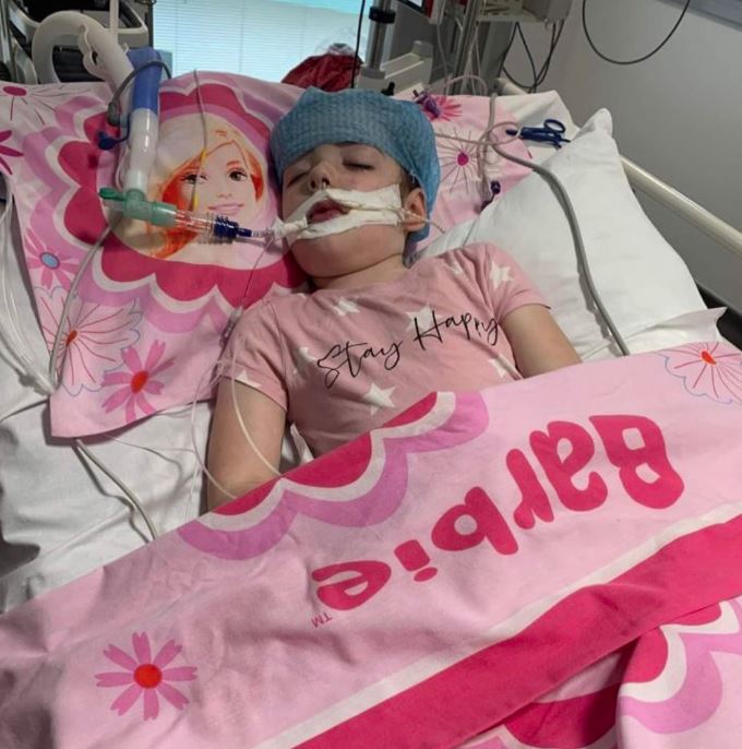Darcy, 7, in hospital. 