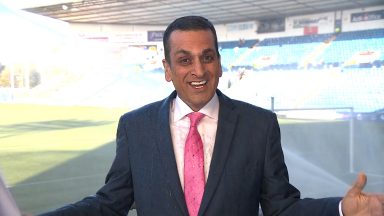 STV News presenter Raman Bhardwaj soaked by sprinklers during live sport report