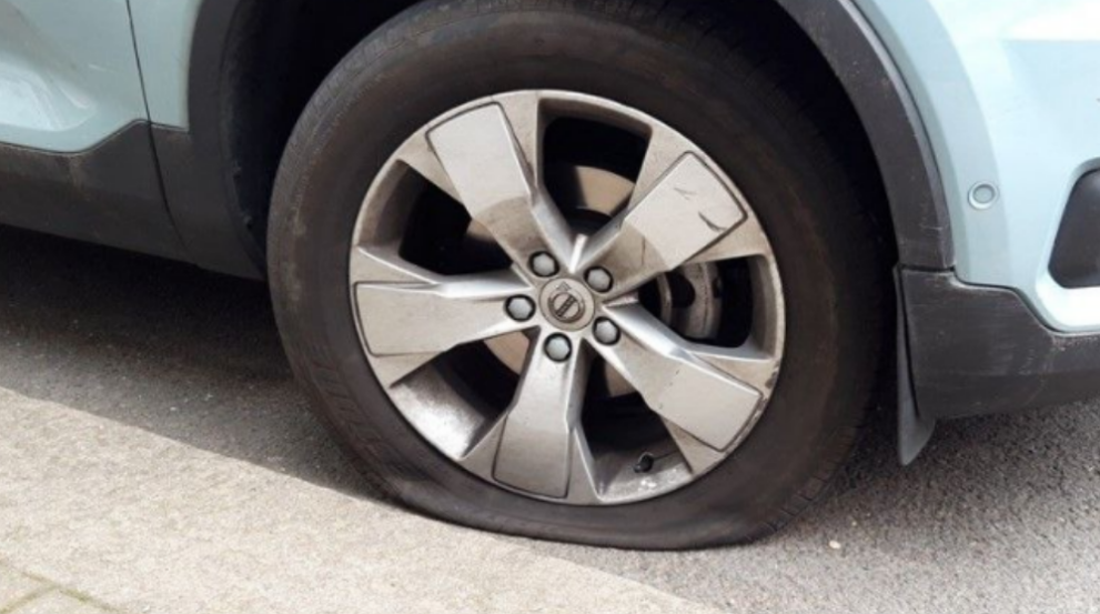 Environmental campaigners deflate tyres of 20 vehicles in Edinburgh