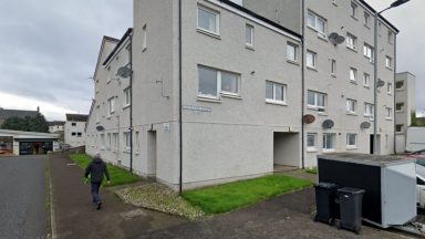 Woman injured in hospital after window fall from Maitland Court, Helensburgh, as man arrested and charged