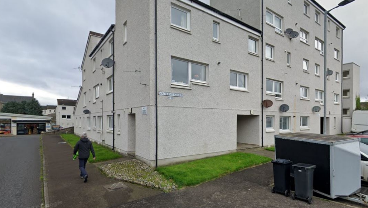 Woman injured in hospital after window fall from Maitland Court, Helensburgh, as man arrested and charged