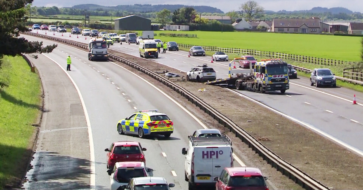 Man, woman and child taken to hospital after M8 crash shut motorway near Edinburgh Airport