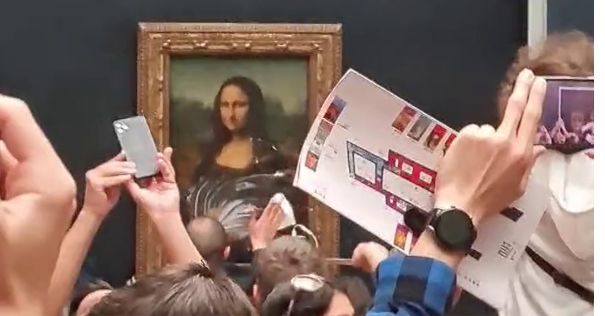 ‘Jaw-dropping’: Man disguised as woman in wheelchair hurls cake at Mona Lisa