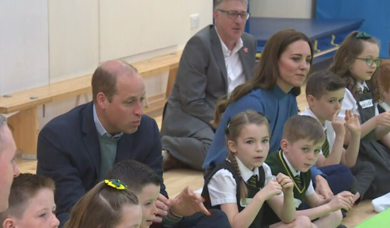 Royal visit: Couple with school pupils in Port Glasgow. 