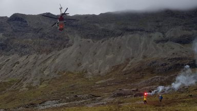 Passing doctor helps rescuers with fall victim airlifted off Cuillin mountain range on Skye