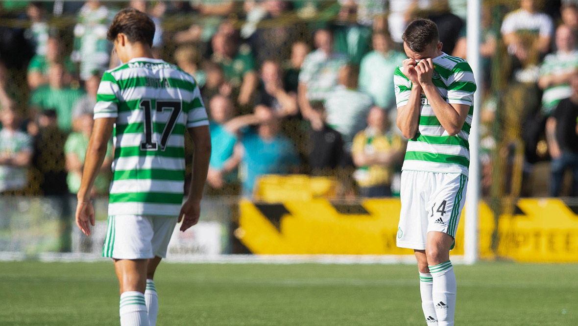 David Turnbull hides his face after Celtic fall to defeat at the Tony Macaroni Arena.