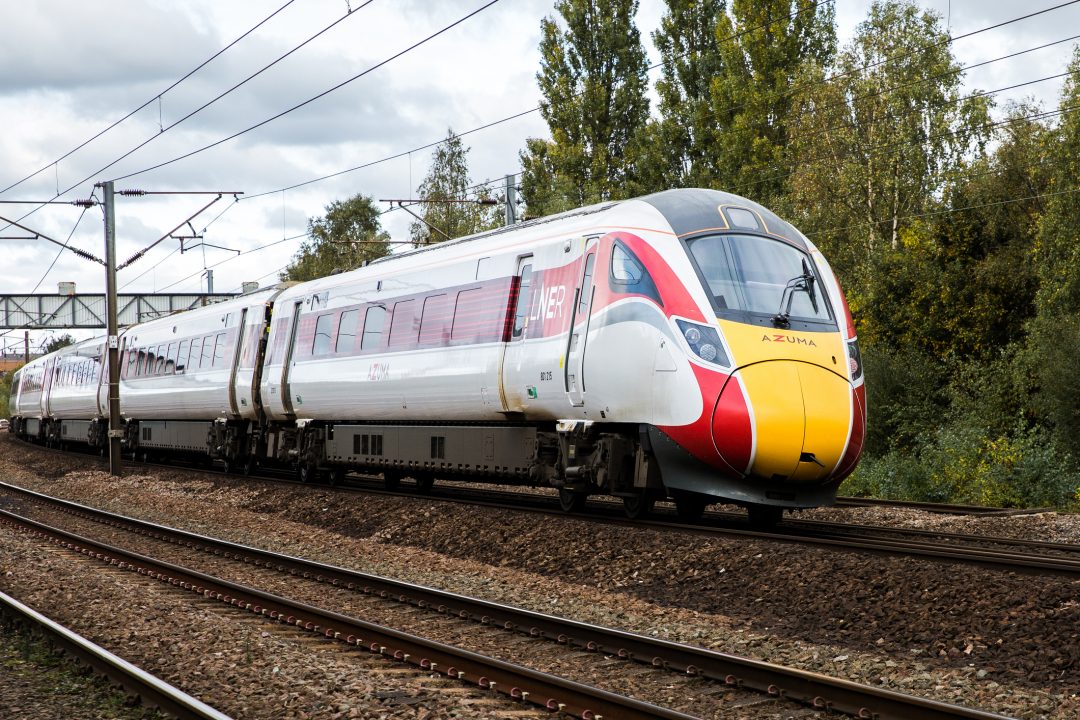 Rail workers overwhelmingly vote to back national strike action over pay and conditions