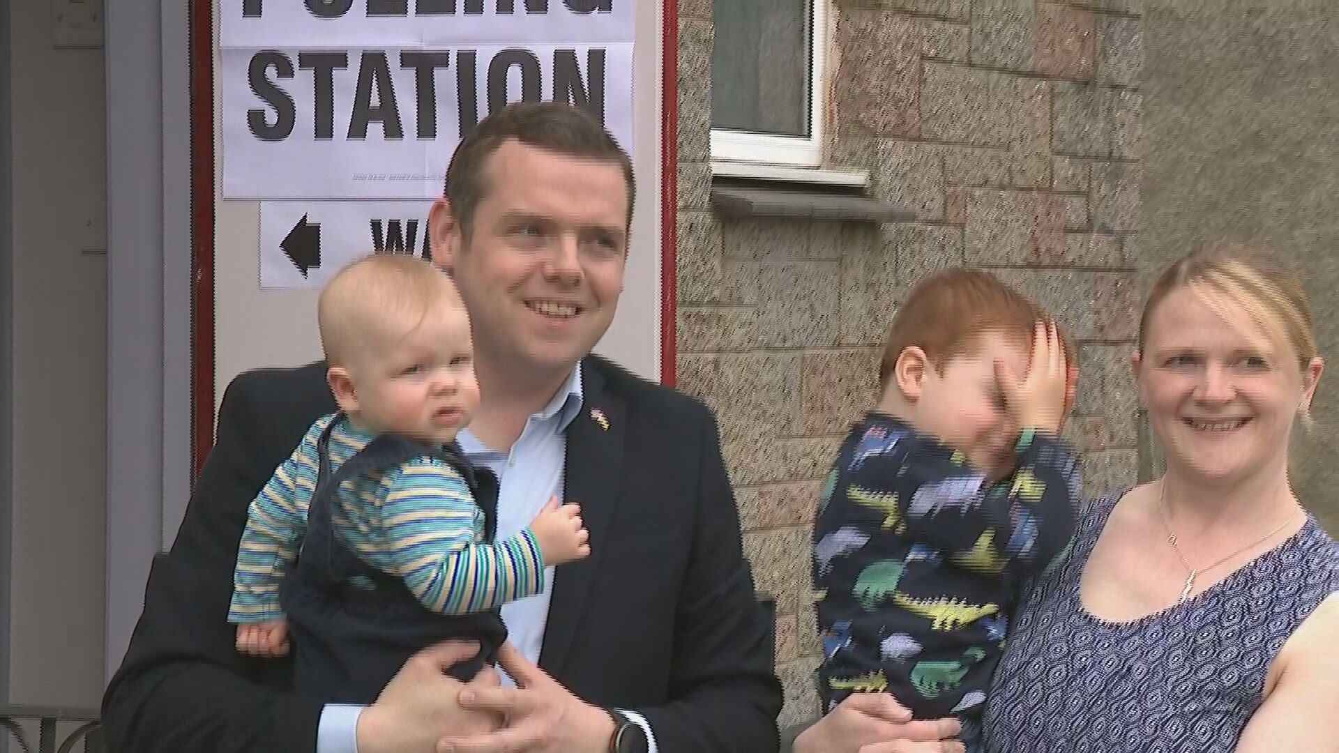 Scottish Conservative leader Douglas Ross and his family at polling station.
