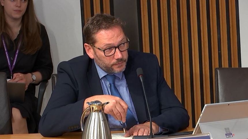 Douglas Lumsden questioned the new permanent secretary. (Scottish Parliament TV)