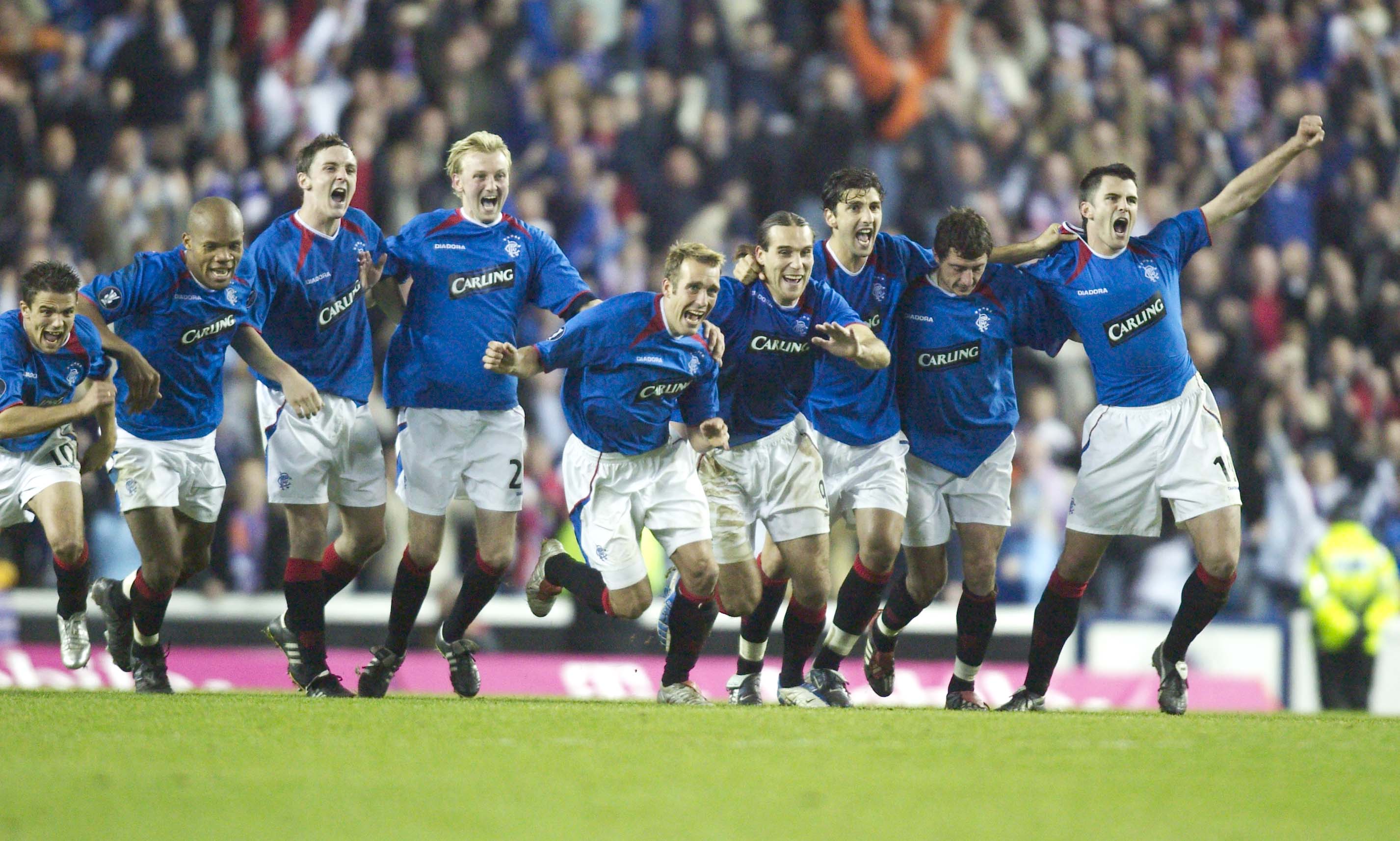 Fernando Ricksen leads the charge from the centre circle after winning the shoot-out.